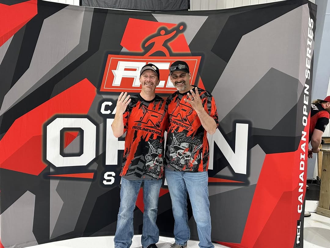 Redline branded event display and team jerseys