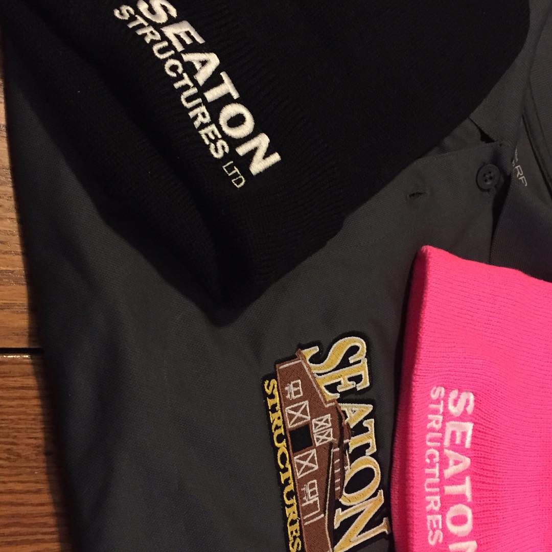 Branded toques and sweaters for cold-weather crews